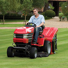 The Westwood Powered Grass Collector uses brushes to sweep grass clippings from the lawn