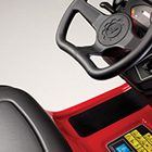 B and C Series garden tractors have a shaped steering wheel and sliding seat for easy access